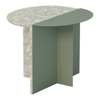 "Round side table with a green terrazzo top and muted green base, featuring a sleek geometric design."