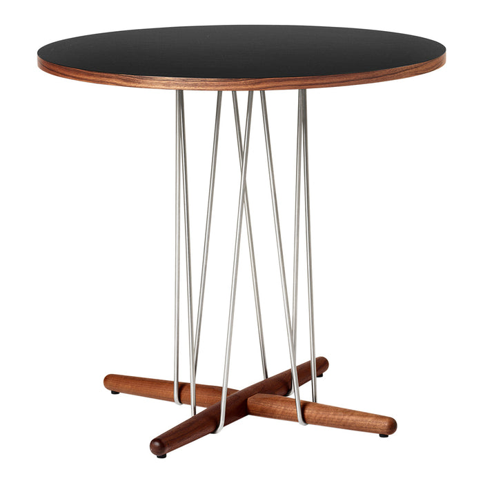 Round black tabletop with a sleek wood and metal base featuring a minimalist design and contrasting brown accents.