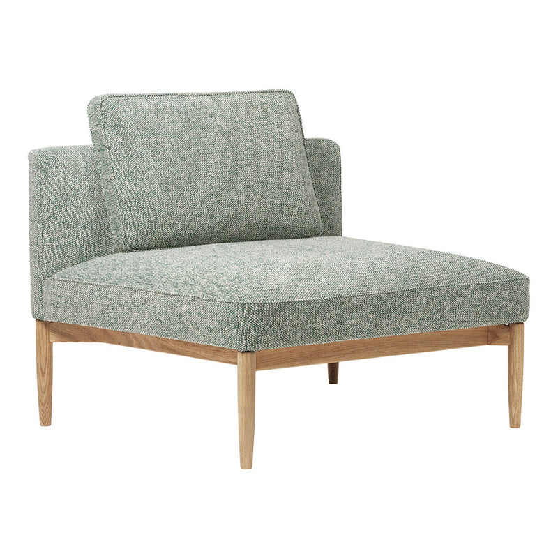 Light green patterned chair with wooden legs, featuring a minimalist design and soft upholstery.