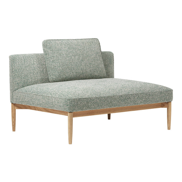 Light green textured fabric chair with a minimalist wooden frame and modern design. Ideal for contemporary interiors.