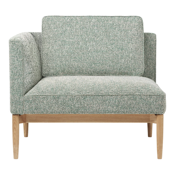 Textured light green and white upholstery with natural wooden legs, perfect for modern decor.