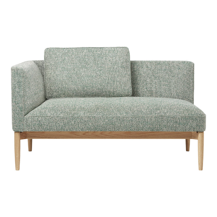 Textured green fabric sofa with light wood legs, featuring a modern, minimalist design. Ideal for contemporary interiors.