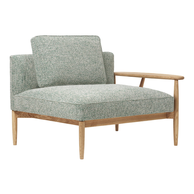Mint green textured upholstery with wooden legs and armrest, showcasing a modern, minimalist design.