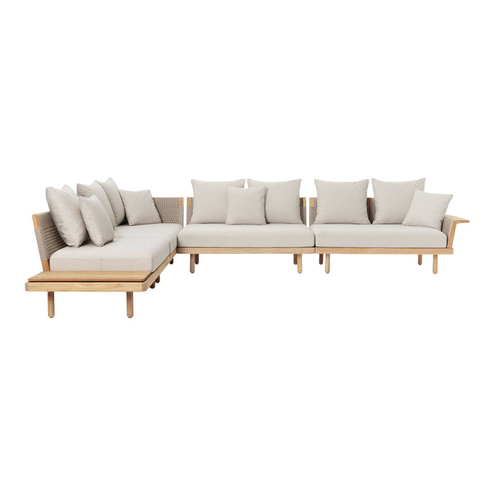 Modern beige sectional sofa with plush cushions and light wooden accents. Elegant and minimalist design for any space.