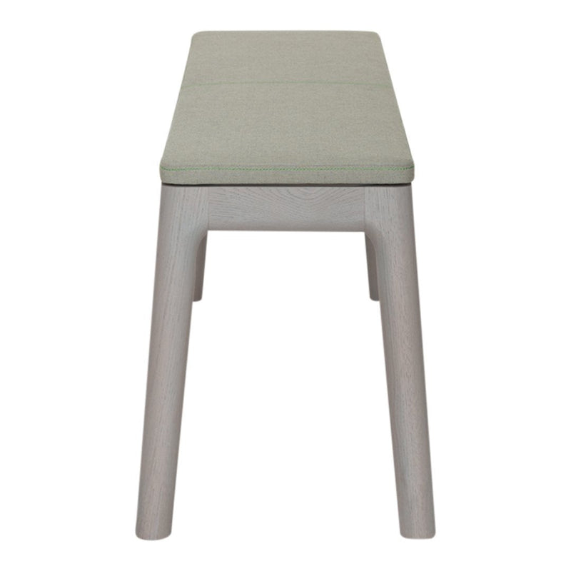 Light gray bench with a soft green cushion, featuring a simple, modern design and clean lines.
