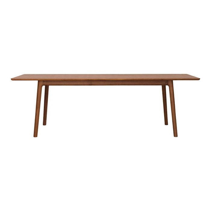 Rectangular wooden dining table in rich brown with a smooth finish and natural grain pattern.