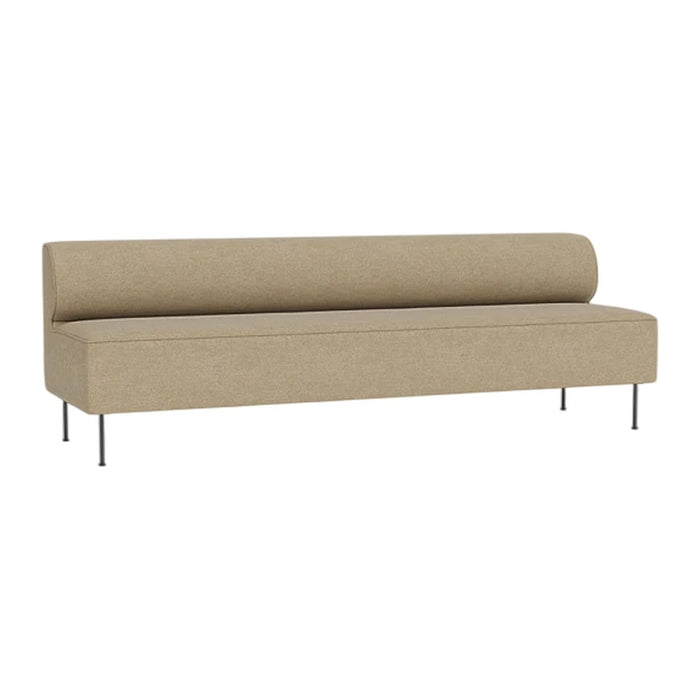 Light tan upholstered sofa with a smooth finish and minimalist design, featuring clean lines and silver legs.