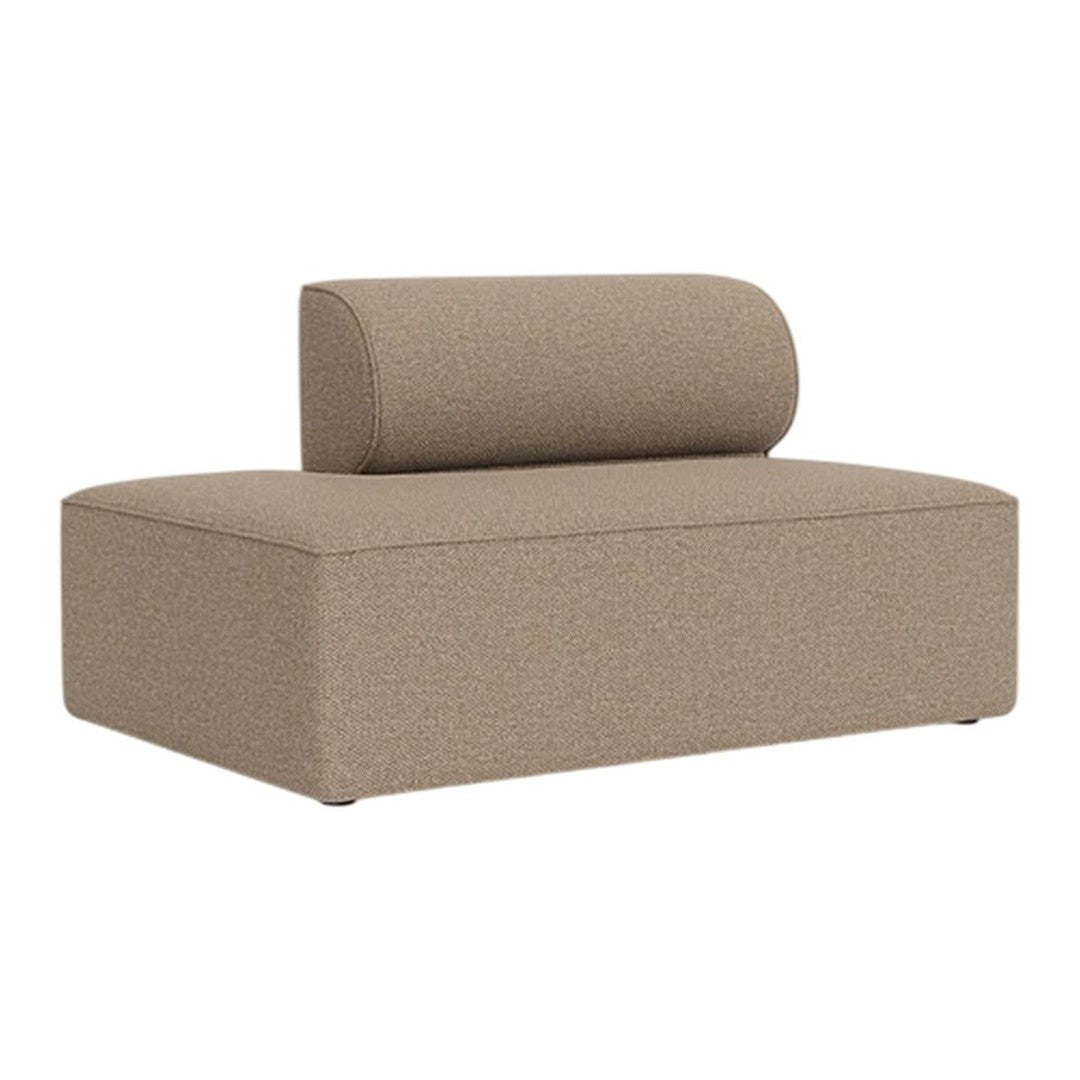 Tan modular sofa with a textured fabric and a rounded lumbar pillow, offering a contemporary and minimalist design.