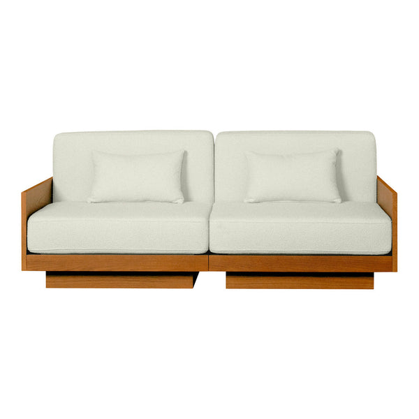Elegant cream sofa with soft cushions and natural wood frame, perfect for modern living spaces.