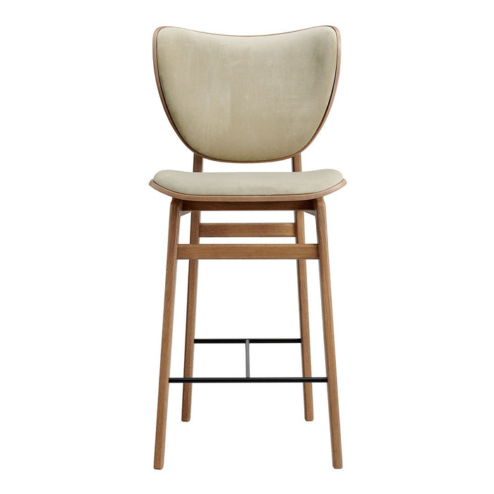 "Light beige upholstered bar stool with natural wood frame and black metal support, featuring a smooth, minimalist design."