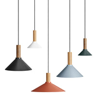 Multicolored pendant lights featuring black, white, blue, green, and terracotta shades with wooden accents.