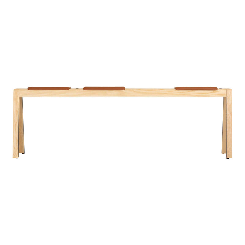 Light wood bench with three brown leather cushions, featuring a minimalist design and natural finish.
