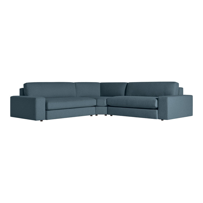 Stylish dark teal sectional sofa with a modern, sleek design and smooth fabric upholstery. Perfect for contemporary spaces.