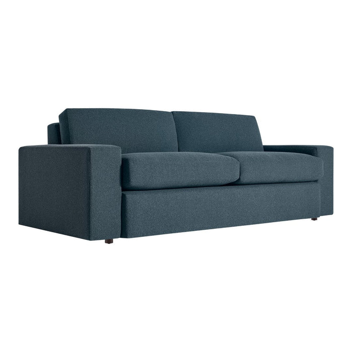Modern dark teal fabric sofa with a sleek, minimalist design and subtle texture, perfect for any living space.