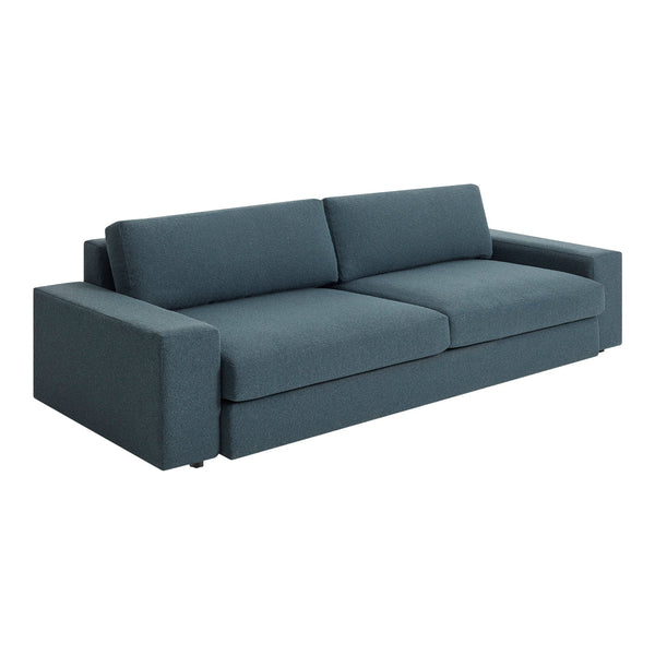Modern sofa in deep teal fabric with a smooth, solid pattern and clean lines for a sleek, contemporary look.