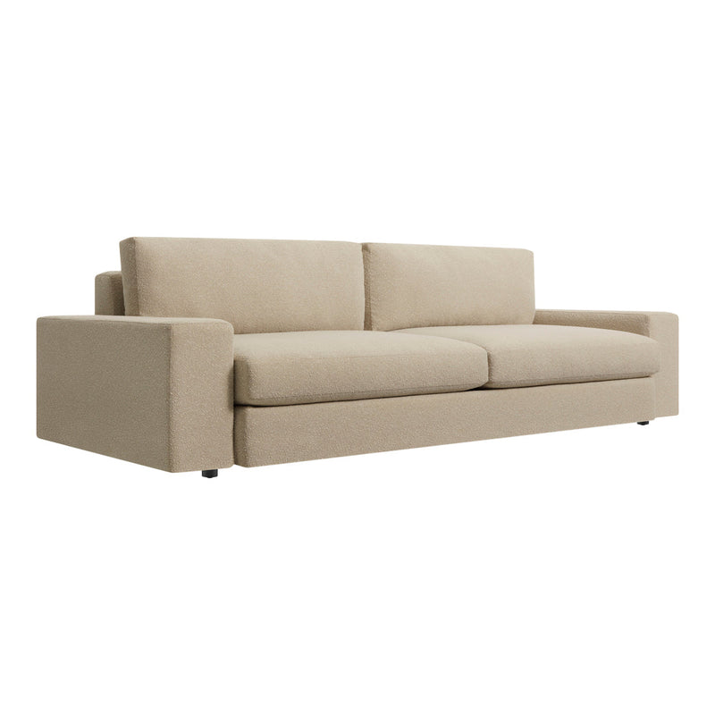 Beige fabric sofa with a minimalist design and clean lines, featuring a smooth texture and modern aesthetic.