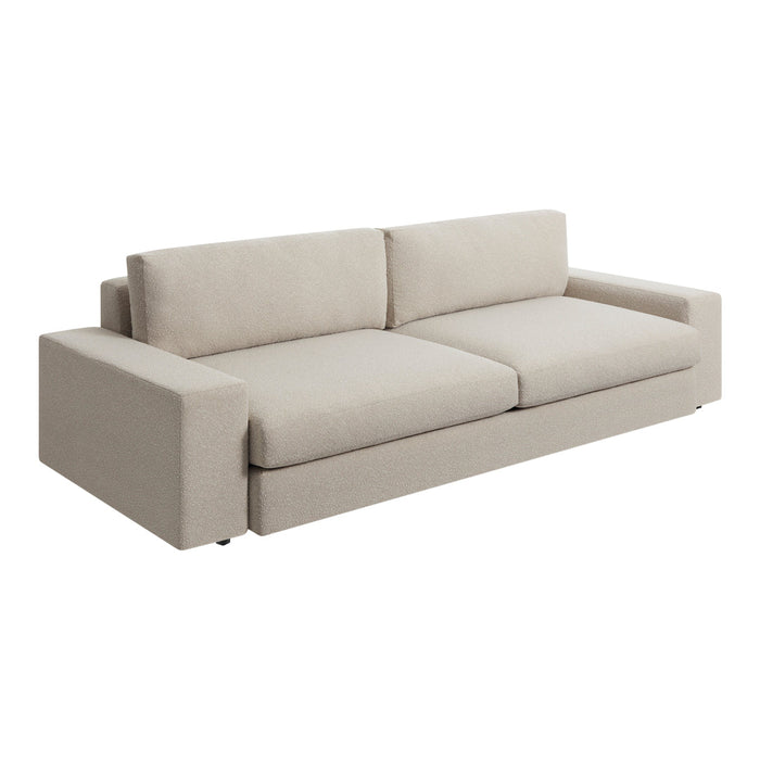 Light beige modern sofa with smooth upholstery and minimalistic design. Perfect for contemporary living spaces.