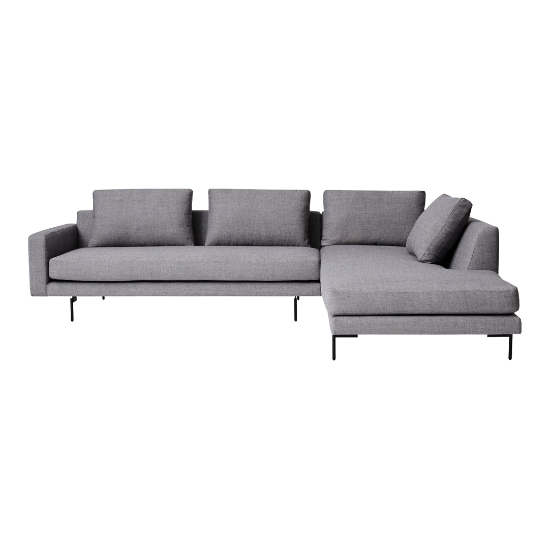 Gray sectional sofa with a sleek, modern design and textured fabric upholstery.