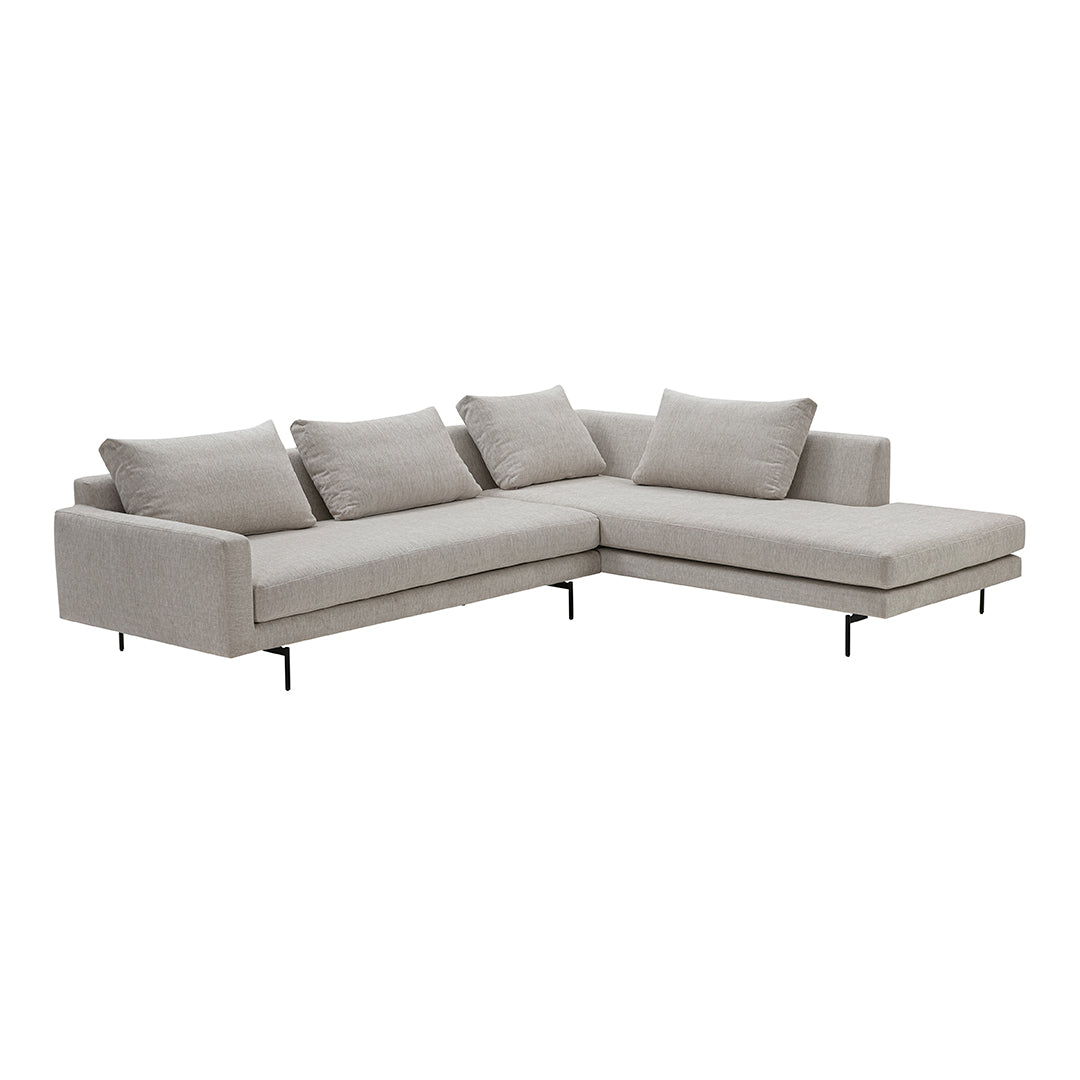 Light gray sectional sofa with smooth fabric and subtle texture, featuring four plush cushions and minimalist design.