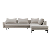 Light beige sectional sofa with a sleek design and soft cushions, featuring clean lines and minimalistic style.