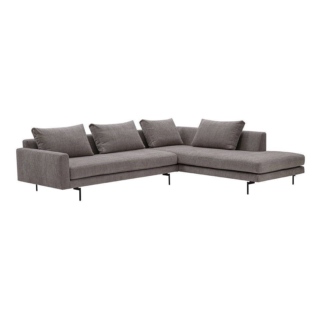 Gray sectional sofa with a modern design, featuring clean lines and soft, textured fabric. Perfect for contemporary spaces.