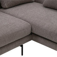 Gray textured fabric sectional sofa corner with clean lines and black metal legs. Perfect for modern living spaces.