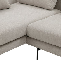 Light gray fabric sectional sofa with a smooth texture and minimalist design. Ideal for modern interiors.