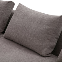 Gray textured couch with a matching cushion, showcasing a soft, subtle pattern. Perfect for modern home decor.