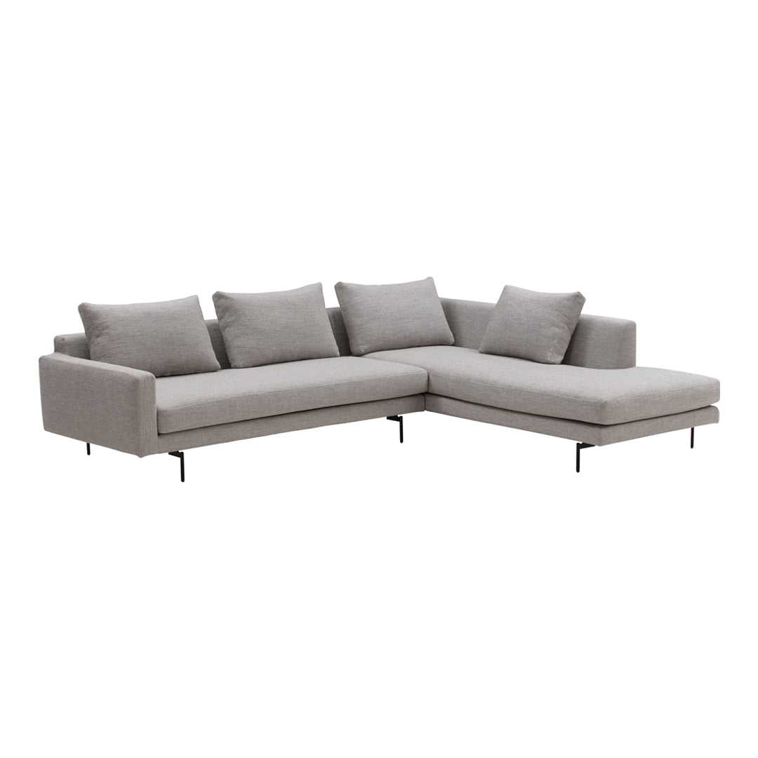 Light gray sectional sofa with clean lines and plush cushions, featuring a minimalist design and modern metallic legs.