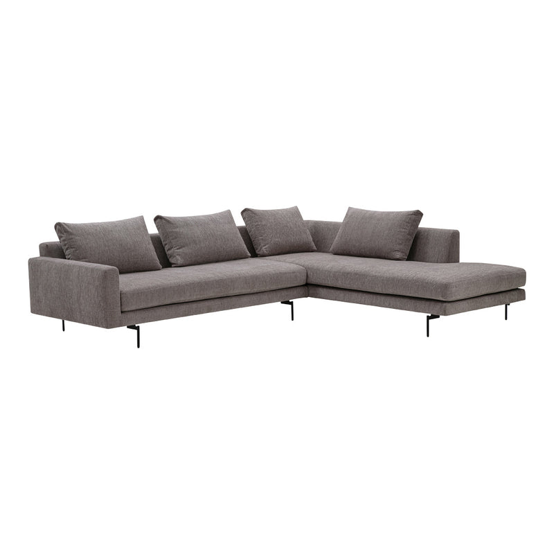 Gray sectional sofa with soft fabric and modern design, featuring clean lines and minimalist accents.