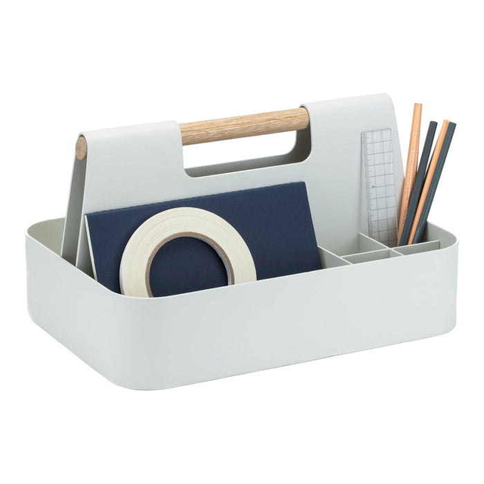 Light grey storage caddy with wooden handle, featuring navy blue and white accents, and a minimalist design.