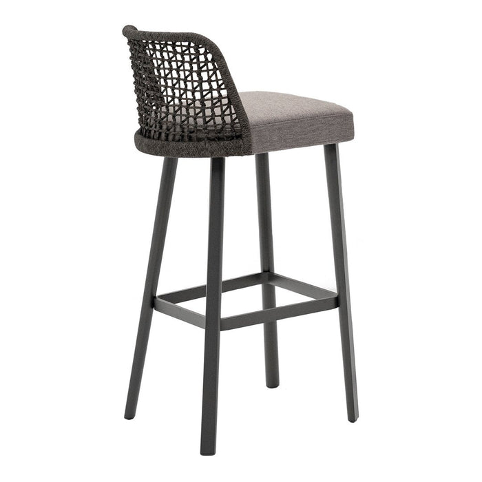 Gray upholstered bar stool with a black woven backrest and sleek black legs, perfect for modern decor.