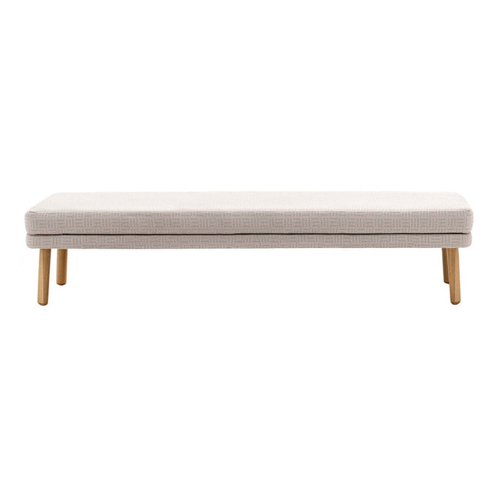 Beige upholstered bench with minimalist design and natural wood legs, perfect for modern decor.