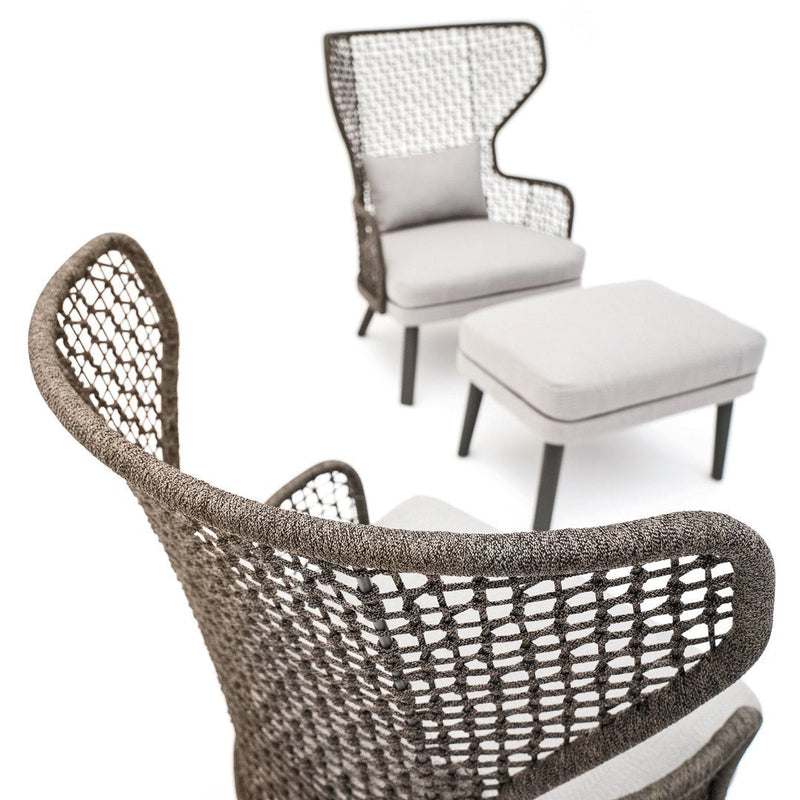 "Stylish woven wicker chairs with a light beige cushion and a modern design, featuring intricate mesh patterns."