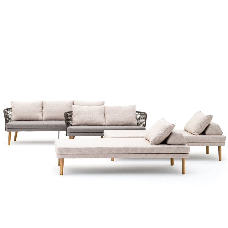 Light beige cushions on a sleek dark gray frame with natural wood legs, featuring minimalist design and clean lines.