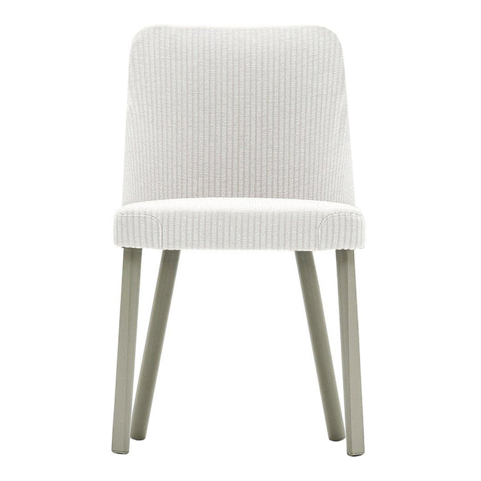 White ribbed fabric dining chair with light gray wooden legs.