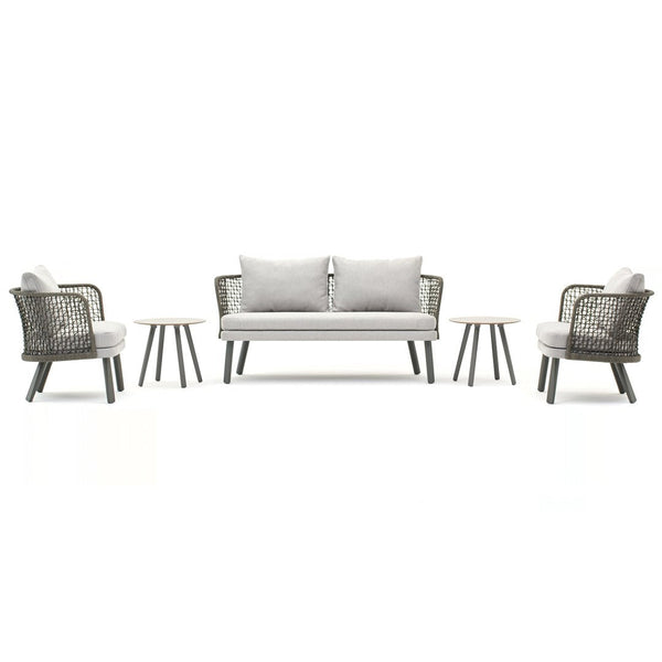 Gray wicker outdoor furniture set with light gray cushions and wooden accent tables. Modern, clean lines and neutral colors.
