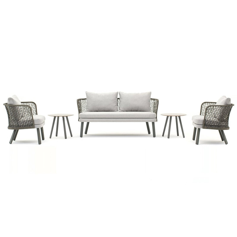 Gray wicker outdoor furniture set with light gray cushions and wooden accent tables. Modern, clean lines and neutral colors.