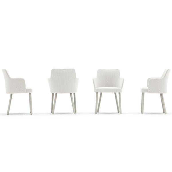 Set of four elegant white chairs with smooth lines and light wooden legs, perfect for modern decor.