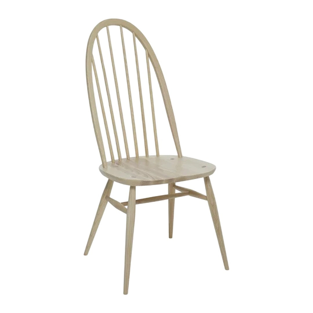Light wood dining chair with a natural finish and minimalist spindle back design. Ideal for modern and rustic decor.