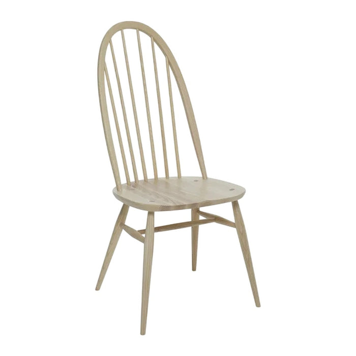 Light wood dining chair with a natural finish and minimalist spindle back design. Ideal for modern and rustic decor.