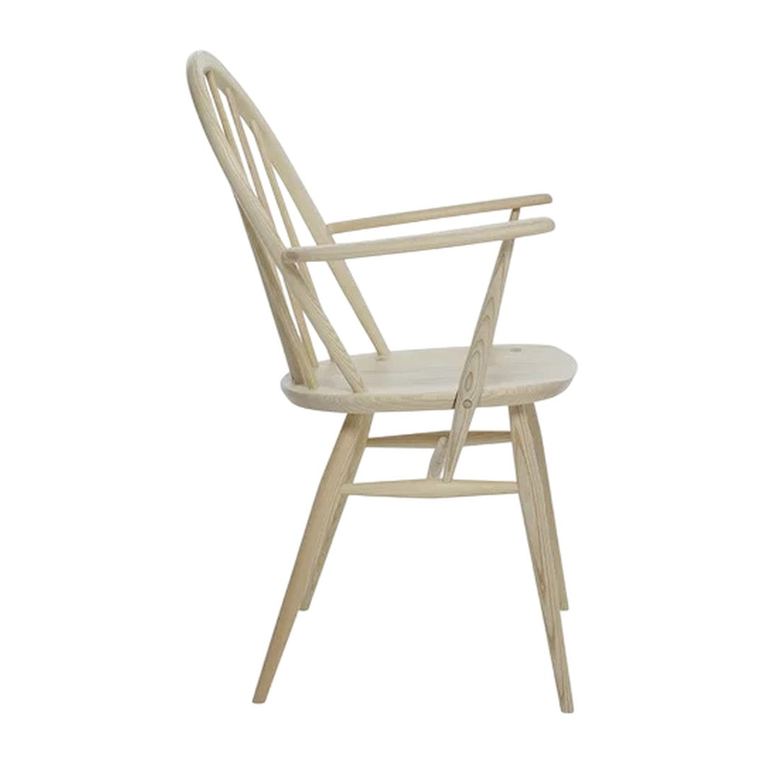 Natural wood color with smooth grain, featuring a minimalist design and classic spindle back pattern.