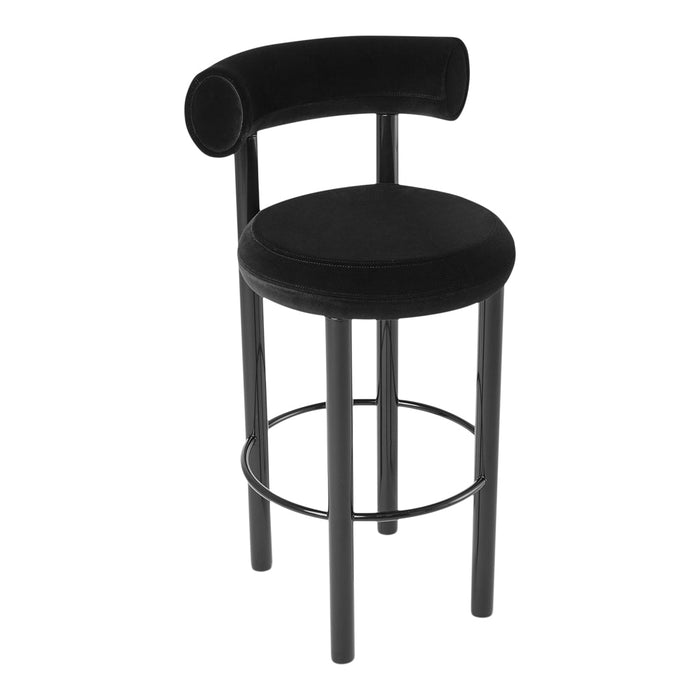 Black velvet bar stool with a sleek, minimalist design and circular seat, featuring a unique curved backrest.
