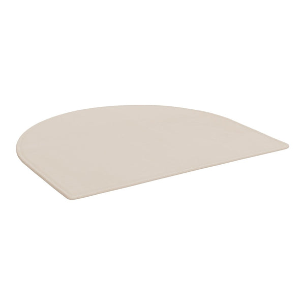 Light beige rounded mat with a smooth, minimalist surface for versatile decor. Ideal for modern spaces.