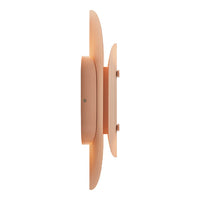 Soft peach wall light with smooth curves and minimalist design, enhancing modern décor.