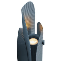 Modern gray lamp with textured shades and a warm, glowing light in the center. Stylish and contemporary design.