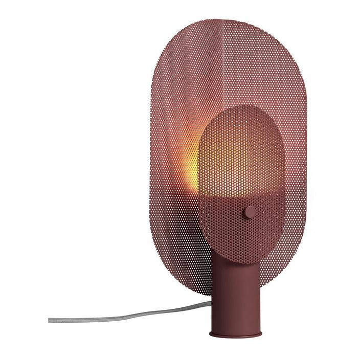 Modern burgundy lamp with a perforated mesh pattern, featuring a warm glow from the circular light source.