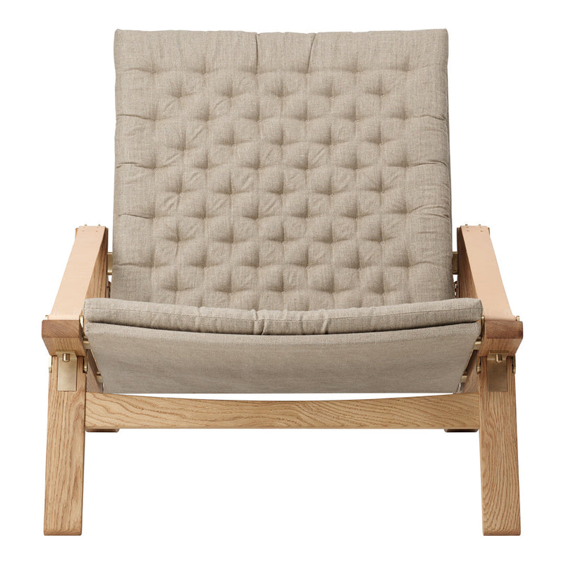 Beige tufted fabric lounge chair with a wood frame, featuring a minimalist design and soft texture. Perfect for modern decor.