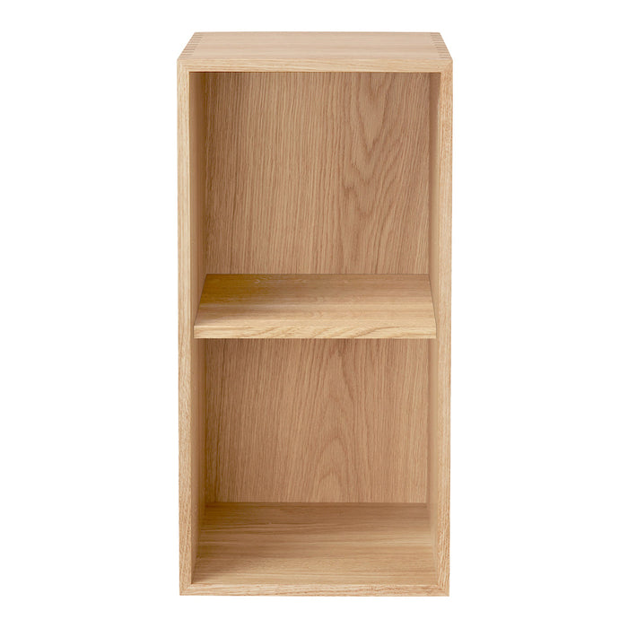 Light oak wood bookshelf with a simple, minimalist design featuring natural grain patterns.