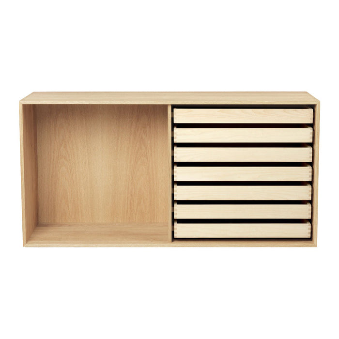 Natural wood finish with six smooth white drawers and an open compartment, creating a minimalist and modern look.